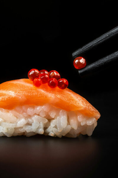 red-caviar-chopsticks-sushi-macro-close-up-view